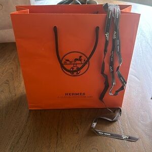 Hermes’ customer bag & ribbon